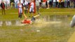 FUNNY England Fans Jump/Fall In Muddy Puddles At Soaked Fan Park | England 2-1 Wales