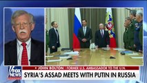 Syria's Assad embraces Putin in Russia