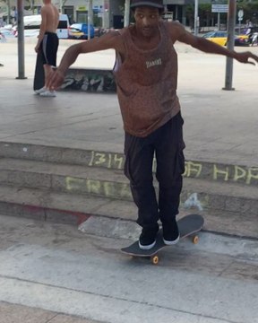 Man Performs Impressive Skateboard Jump in Reverse