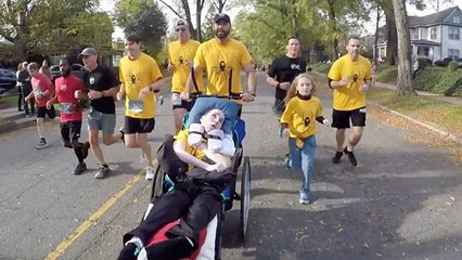 Best Friend Helps Paralyzed Buddy Compete In 5K