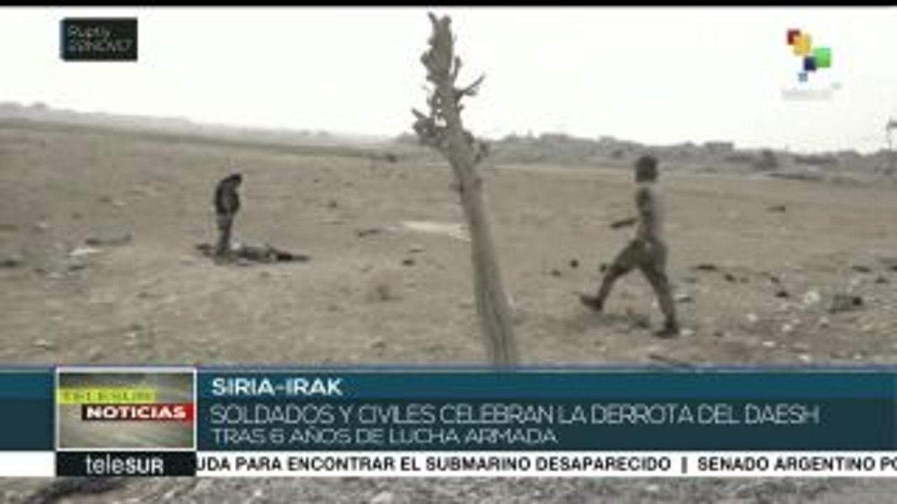 Sirios e iraquíes festejan la derrota de Estado Islámico