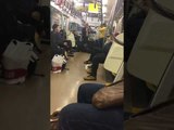 Trombone Players Perform Solemn Song on Tokyo Subway