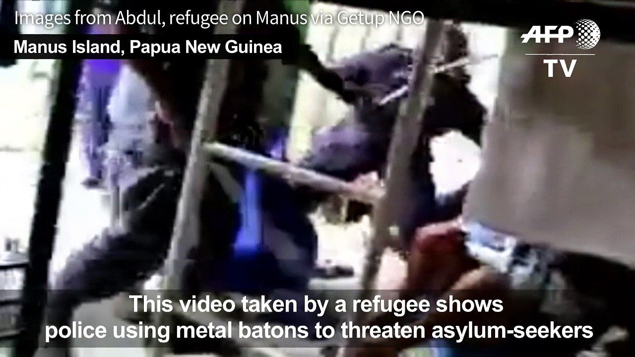 Baton-wielding police clear closed Australia refugee camp in PNG