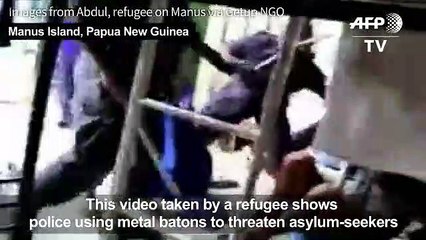 Baton-wielding police clear closed Australia refugee camp in PNG