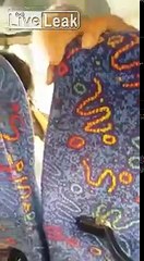 Man screaming on a person in a bus