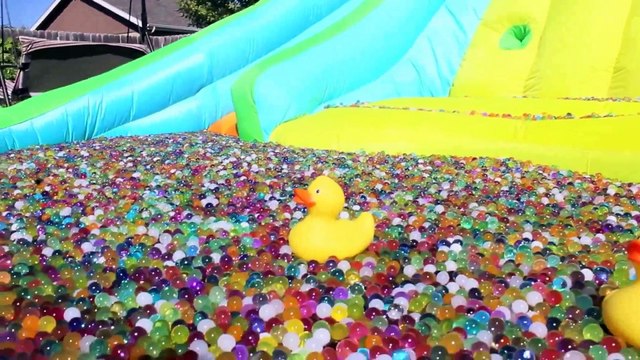 ONE MILLION ORBEEZ BATH! EPIC WATER SLIDE POOL - KID SUMMER FUN!! | Superheroes | Spiderman | Superman | Frozen Elsa | Joker
