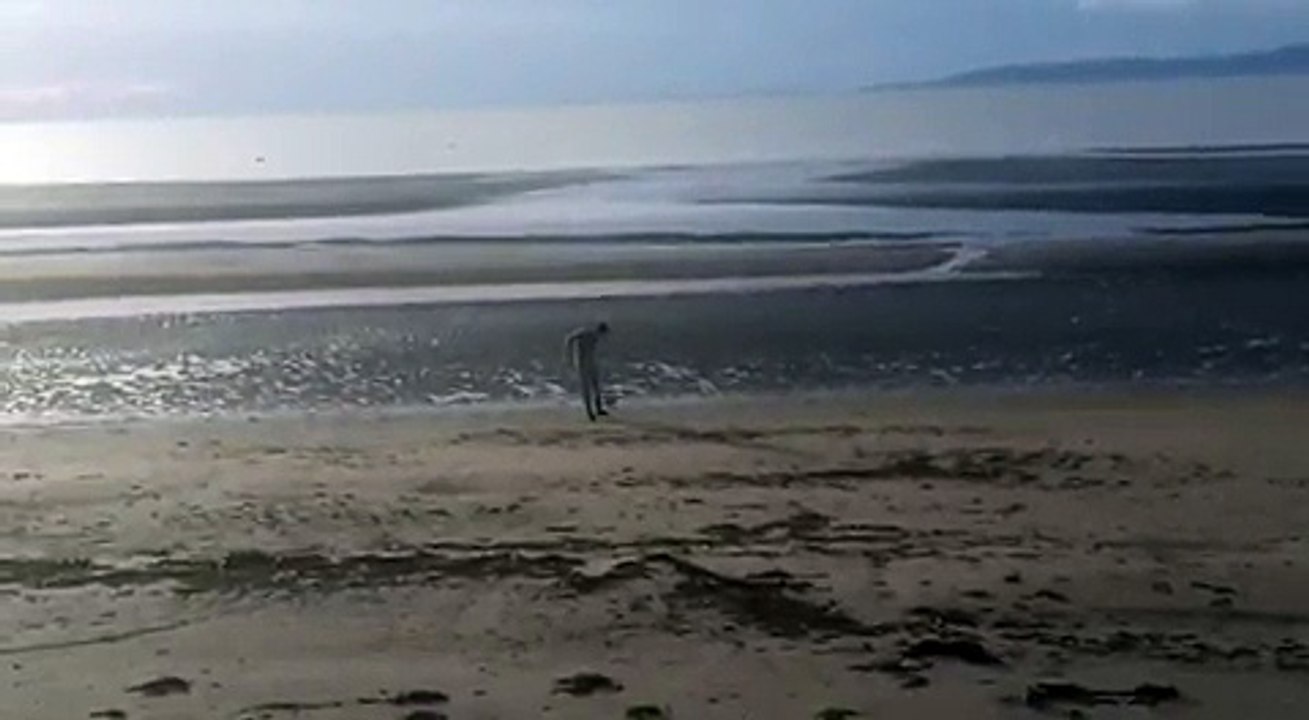 On a beach playing football ⚽️