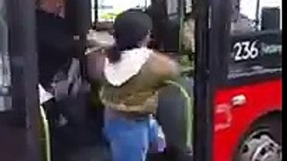 Group of people fight on London bus
