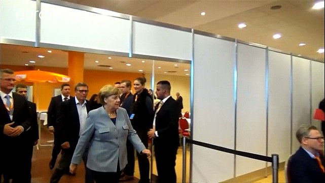 Merkel plays down talk of new elections as German 'Grand Coalition' gathers pace