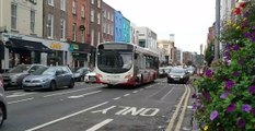 Single Deck Bus Eireann buses at Roches St/O'Connell St, Limerick Town Centre, Ireland - August 2017