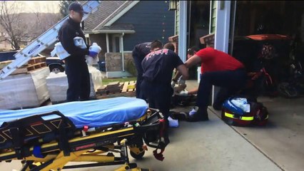 Firefighters Finish Hanging Christmas Lights After Man Falls from Ladder, Breaks Leg