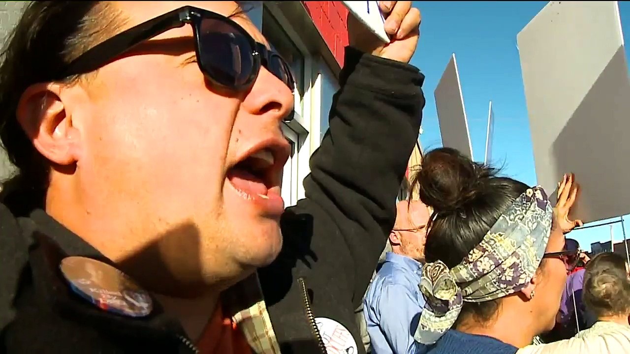 Dozens Protest at Denver Coffee Shop Over Contr...