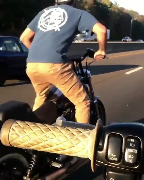 Doing wheelies down the highway on a Harley