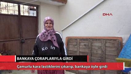 Çamurlu kara lastiklerini çıkarıp, bankaya öyle girdi