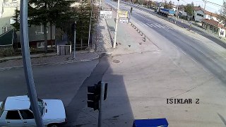 Car runs a red light and crashes into another car
