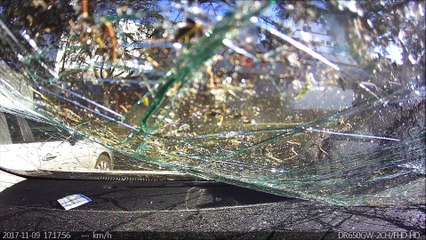 Out of Control Driver Runs Over Another Car