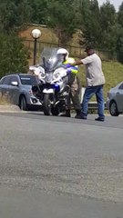 Cop Struggles to Mount Motorcycle