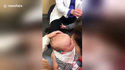 Heartwarming video of a baby hearing for the first time