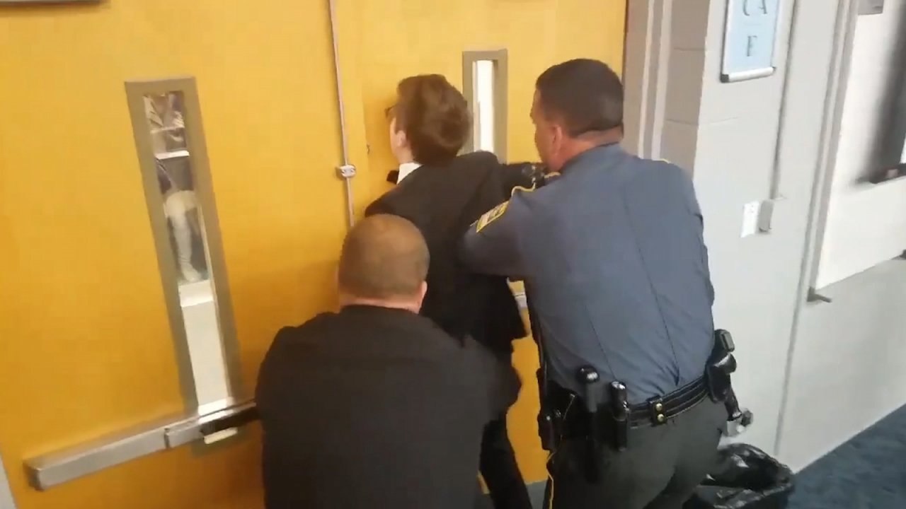 'It's OK to be white' speaker arrested following altercation with protester