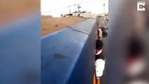 That takes train-ing – Train surfer pulls stunt under bridge 