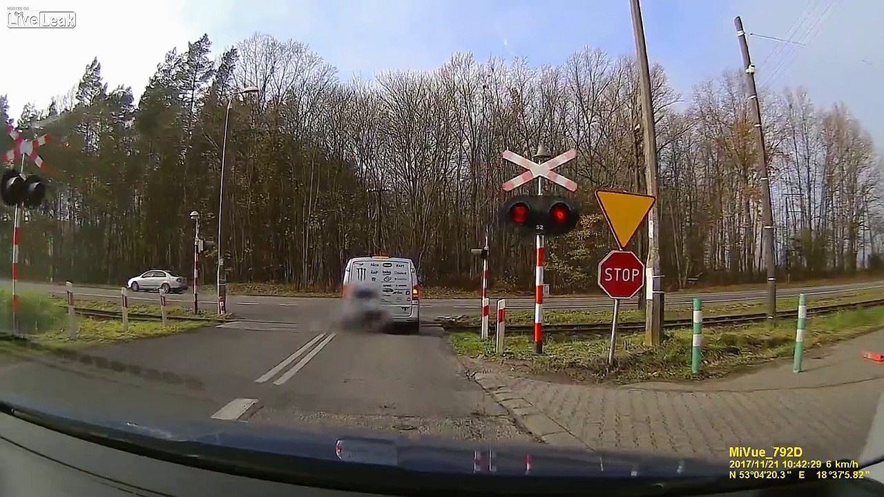 Van vs. train... Railroad crossing accident