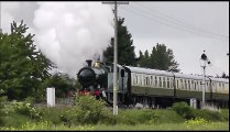 Steam Train English Tank Engine puffing along with 6 Coaches