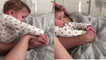 Hilarious moment a baby refuses to share her dad with her mum