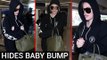 Pregnant Khloe Kardashian HIDES BABY BUMP With A Bag