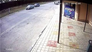 Lada drivers hits a pedestrian and almost crashes head on, then blames the pedestrian