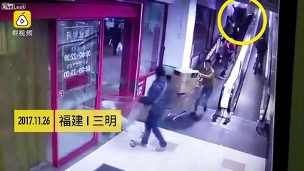 Cart full of products rolls down an escalator, hitting multiple people