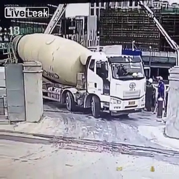 Cement truck falls down in a big hole