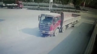 Scooter driver miraculously survives being dragged by lorry