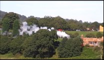 Steam Engine pulling a Freight Train across British Countryside