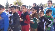 Kilis'te Suriyeli Yetim Çocuklara Mont ve Ayakkabı Dağıtıldı
