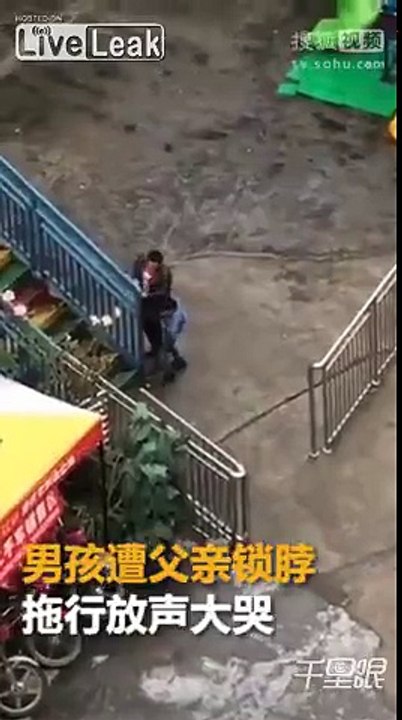 Child is tied to the fence by his father and is beaten with a stick