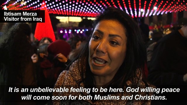 Palestinians light up Christmas tree in Bethlehem