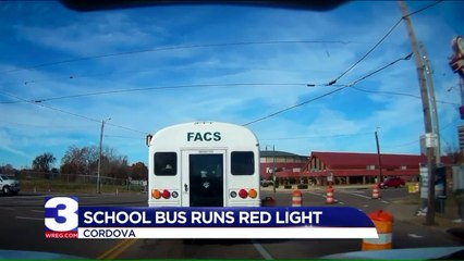 Dashcam Captures Bus with Students on Board Run Red Light