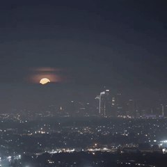 Stunning Supermoon Seen Rising Over Los Angeles Skyline