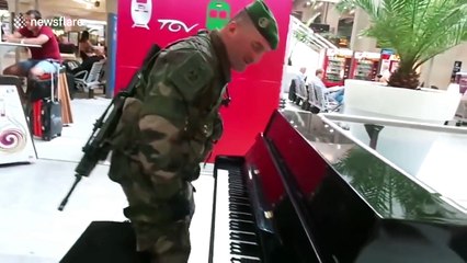 French soldier sings and plays piano at Paris train station