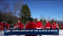 i24NEWS  DESK | Skiing Santas hit the slopes in Maine | Monday, December 4th 2017