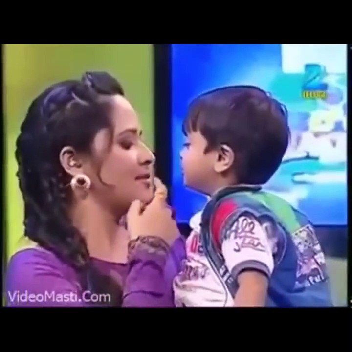 Little Boy Kissing Young Girl