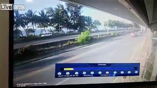 Overtaking car loses control and gets hit by a semi-truck