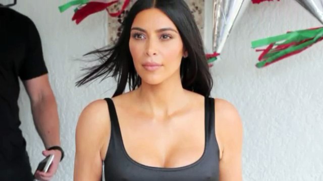 Kim Kardashian and Kourtney Kardashian Show Off Their Pre-Halloween Costumes