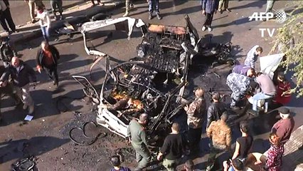 Descargar video: Car bomb blast kills eight in Syria's Homs