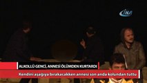 Alkollü genci ölümün kıyısından annesi aldı