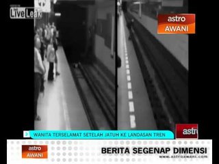 Wanita terselamat setelah jatuh ke landasan tren