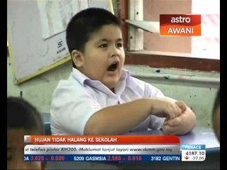 Hujan tidak halang pelajar ke sekolah