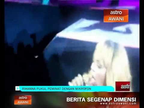 Rihanna pukul peminat dengan mikrofon