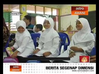 Gelagat pasangan kembar hari pertama sekolah