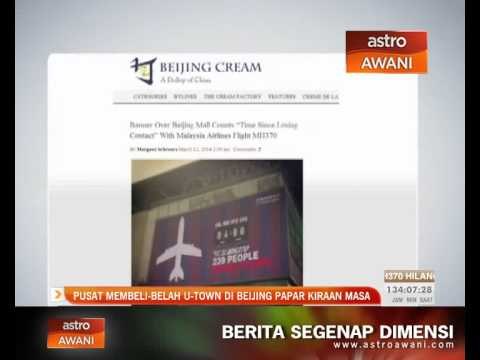 Pusat membeli-belah U-Town di Beijing papar kiraan masa